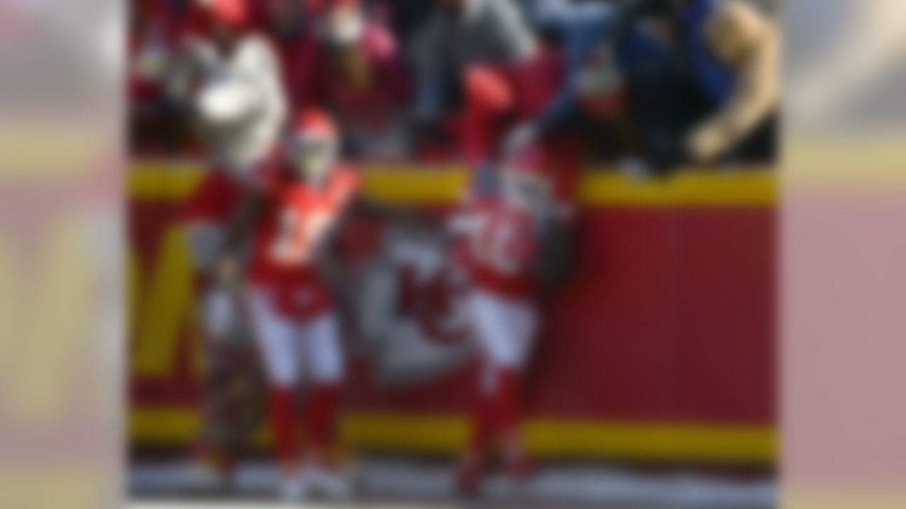 Kansas City Chiefs wide receiver Tyreek Hill (10) celebrates with fans after he scored a touchdown on a 68-yard rush during the first half of an NFL football game against the Tennessee Titans in Kansas City, Mo., Sunday, Dec. 18, 2016. (AP Photo/Ed Zurga)