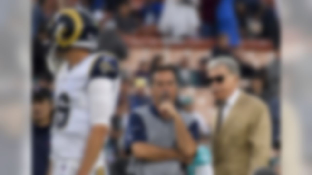 Los Angeles Rams owner Stan Kroenke, from right, head coach Jeff Fisher watch as quarterback Jared Goff warms up before an NFL football game against the Miami Dolphins Sunday, Nov. 20, 2016, in Los Angeles. (AP Photo/Mark J. Terrill)