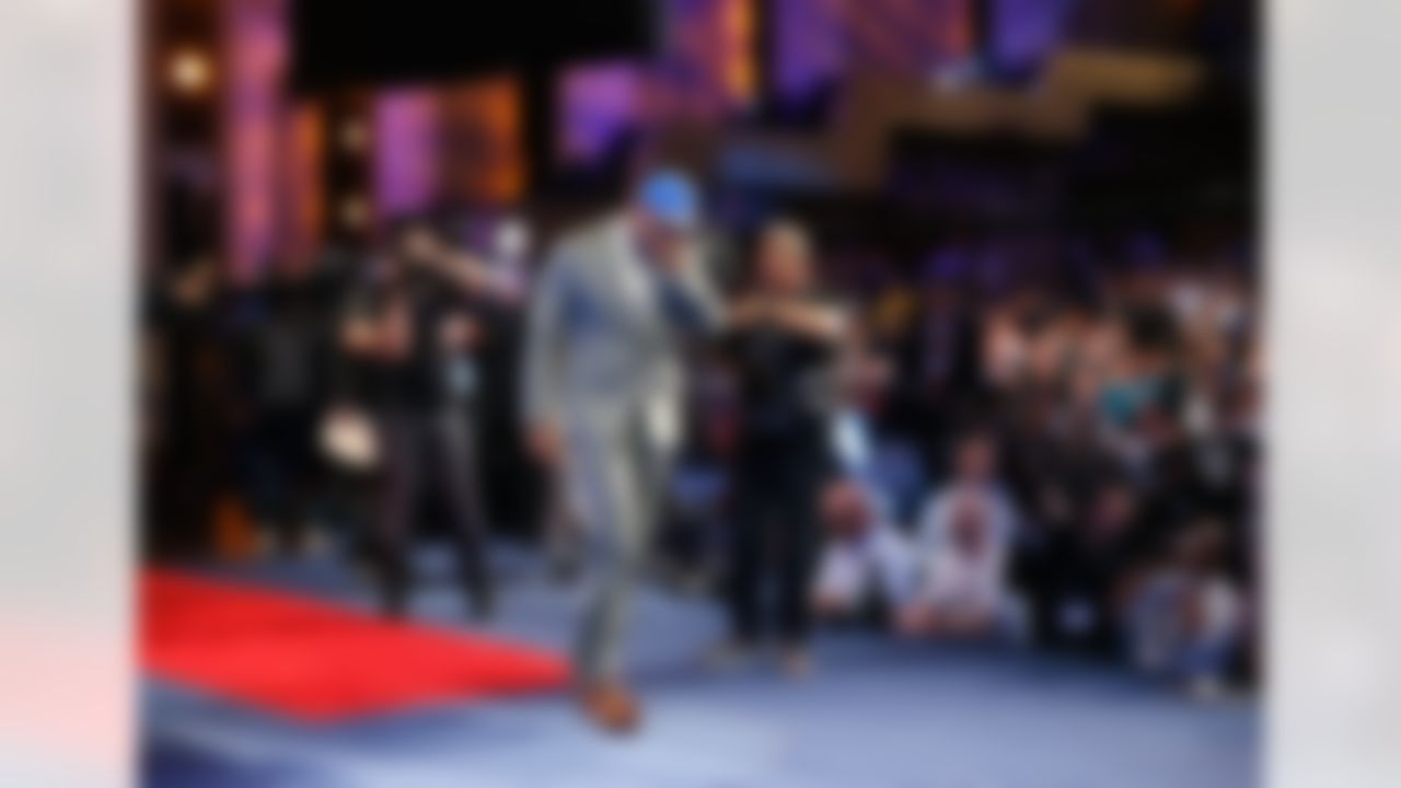Eric Ebron walks on stage after being selected by the Detroit Lions {during the 2014 NFL Draft at Radio City Music Hall on May 8, 2014 in New York, NY. (Ben Liebenberg/NFL)