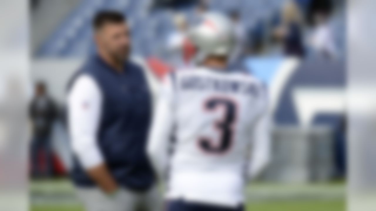 Tennessee Titans head coach Mike Vrabel, left, talks with New England Patriots kicker Stephen Gostkowski (3) before an NFL football game Sunday, Nov. 11, 2018, in Nashville, Tenn. (AP Photo/Mark Zaleski)