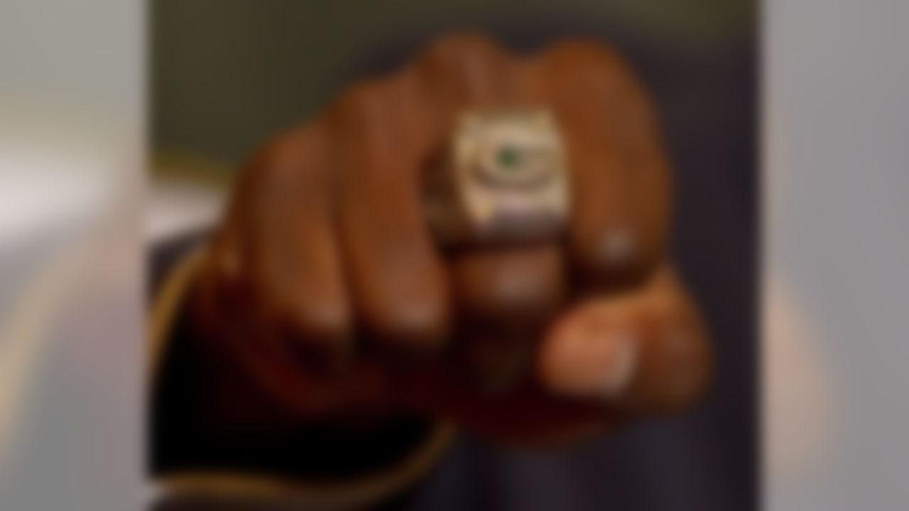 Green Bay Packers' Donald Driver shows off his Super Bowl ring, Thursday, June. 16, 2011, after the Packers ring ceremony at Lambeau Field in Green Bay, Wis. The Packers defeated the Pittsburgh Steelers in the NFL Super Bowl football championship game Feb. 6.  (AP Photo/Mike Roemer)