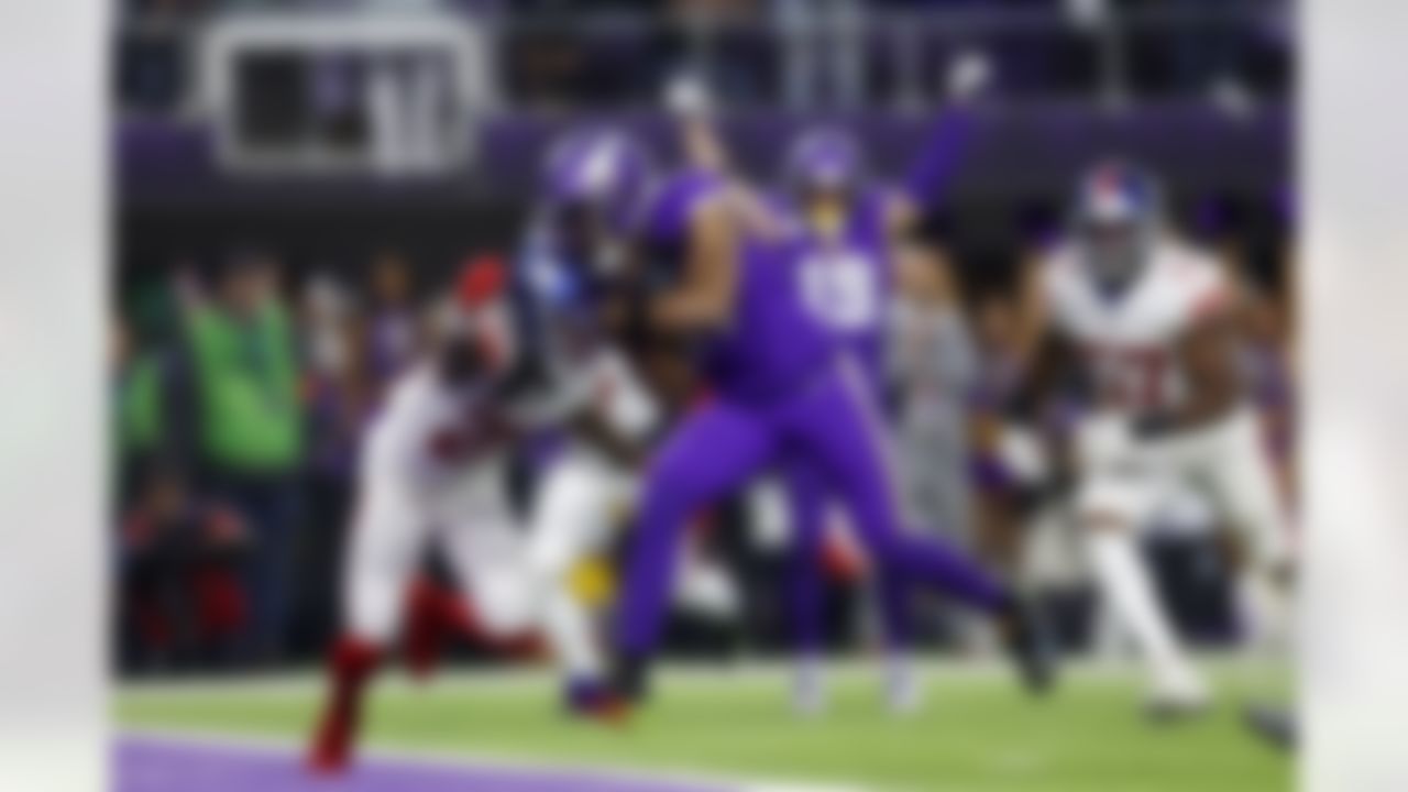 Minnesota Vikings wide receiver K.J. Osborn (17) runs the ball for a touchdown during an NFL Super Wild Card Weekend playoff game against the New York Giants on Sunday, January 15, 2023 in Minneapolis, Minnesota.