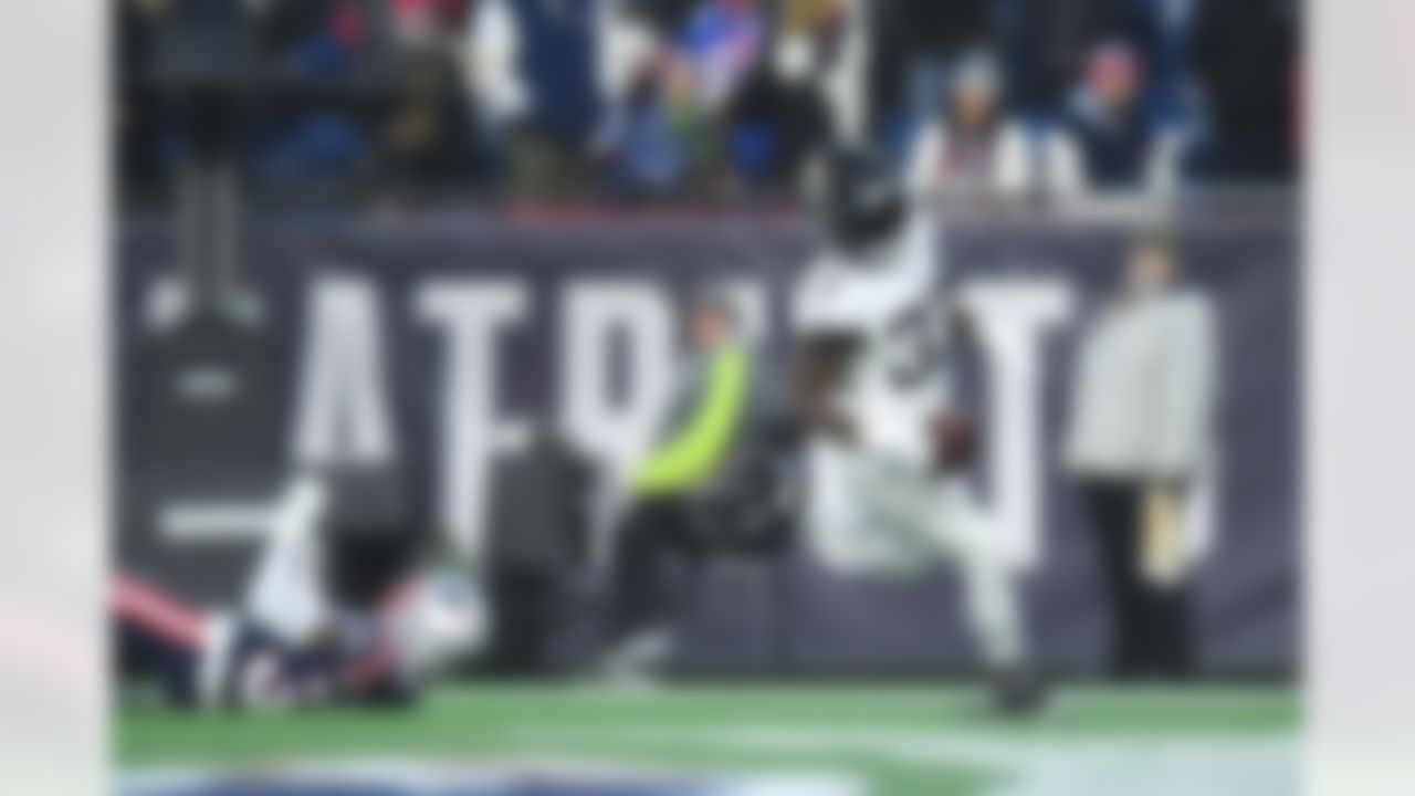 Jacksonville Jaguars running back Dare Ogunbowale (33) scores a touchdown during an NFL football game against the New England Patriots on Sunday, January 2, 2022 in Foxborough, Massachusetts.