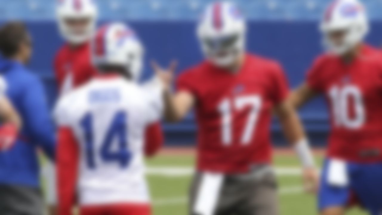 Buffalo Bills wide receiver Stefon Diggs (14) and quarterback Josh Allen (17) react during NFL football practice in Orchard Park, N.Y., Wednesday, June 2, 2021.