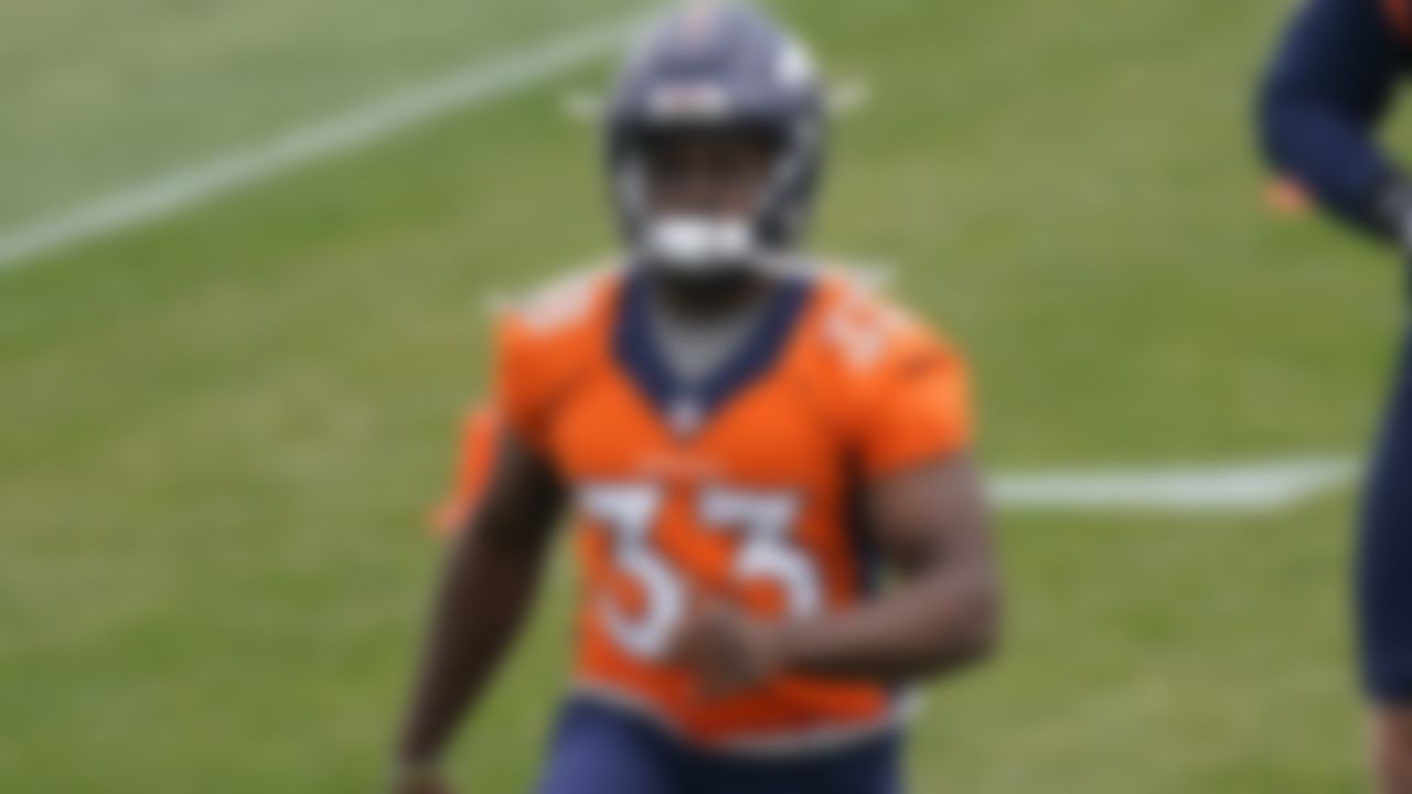 Denver Broncos running back Javonte Williams takes part in a drill during an NFL football rookie minicamp at the team's headquarters Saturday, May 15, 2021, in Englewood, Colo.