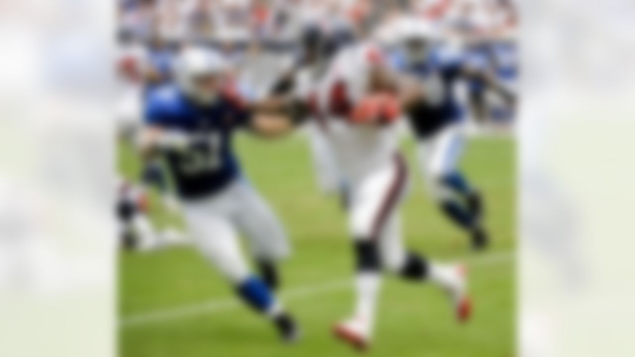 Houston Texans' Ben Tate (44) pushes off Indianapolis Colts' Pat Angerer (51) during the fourth quarter of an NFL football game Sunday, Sept. 11, 2011, in Houston. (AP Photo/Dave Einsel)