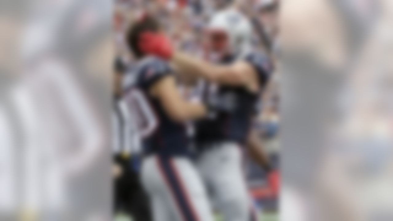 New England Patriots wide receiver Danny Amendola, left, celebrates his touchdown with Julian Edelman, right, during the first half of an NFL football game against the Miami Dolphins, Sunday, Sept. 18, 2016, in Foxborough, Mass. (AP Photo/Steven Senne)