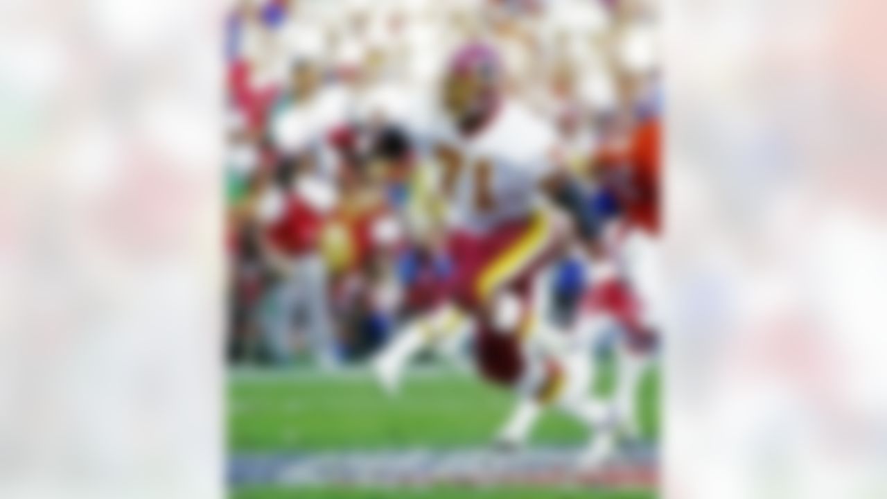 Washington Redskins defensive end Charles Mann (71) charges upfield during Super Bowl XXII, a 42-10 victory over the Denver Broncos on January 31, 1988, at Jack Murphy Stadium in San Diego, CA. (National Football League)