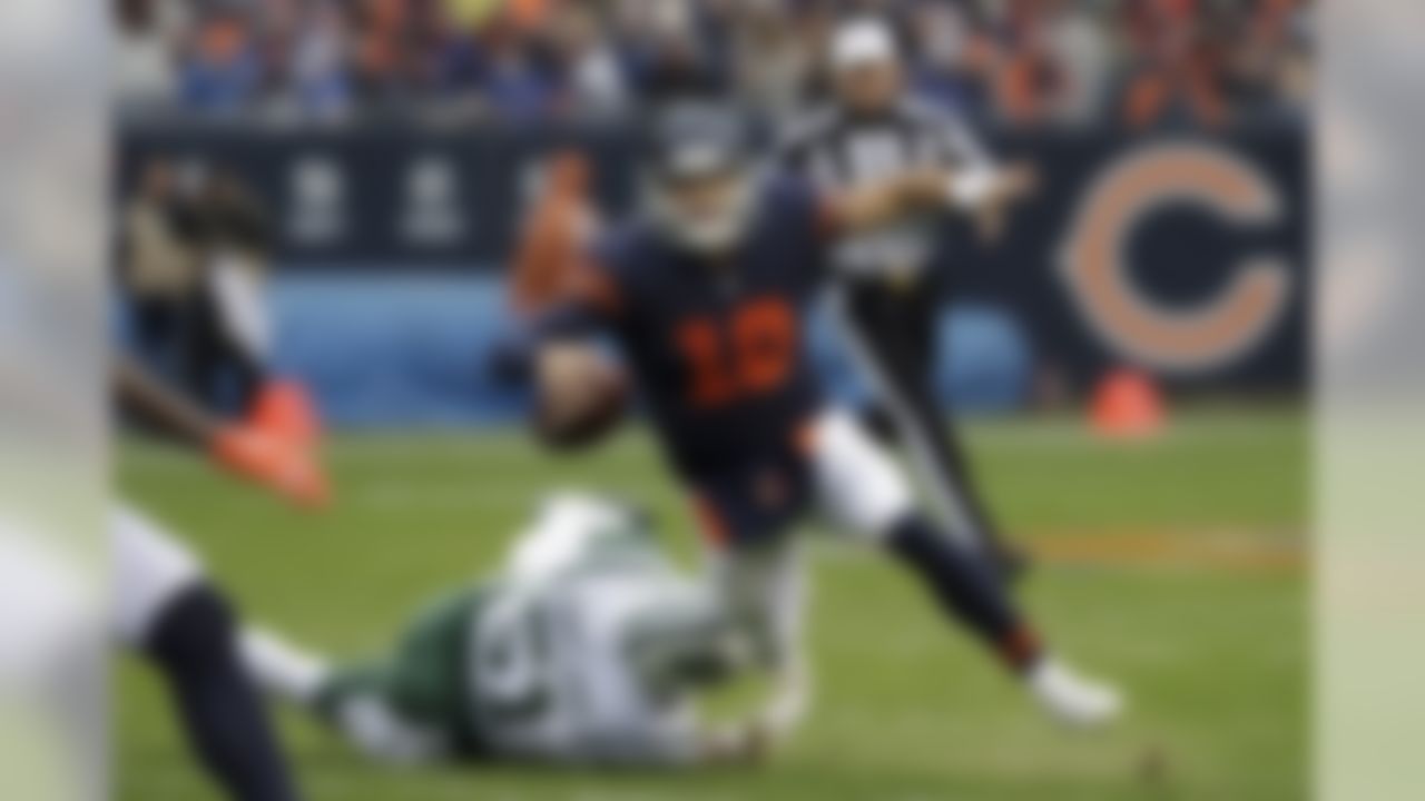 Chicago Bears quarterback Mitchell Trubisky (10) is tripped by New York Jets outside linebacker Brandon Copeland (51) during the first half of an NFL football game Sunday, Oct. 28, 2018, in Chicago. (AP Photo/Nam Y. Huh)