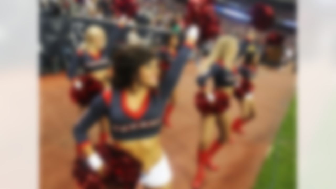 Houston Texans cheerleaders perform during the third quarter of an NFL wild card playoff football game against the Cincinnati Bengals Saturday, Jan. 5, 2013, in Houston. (AP Photo/Patric Schneider)