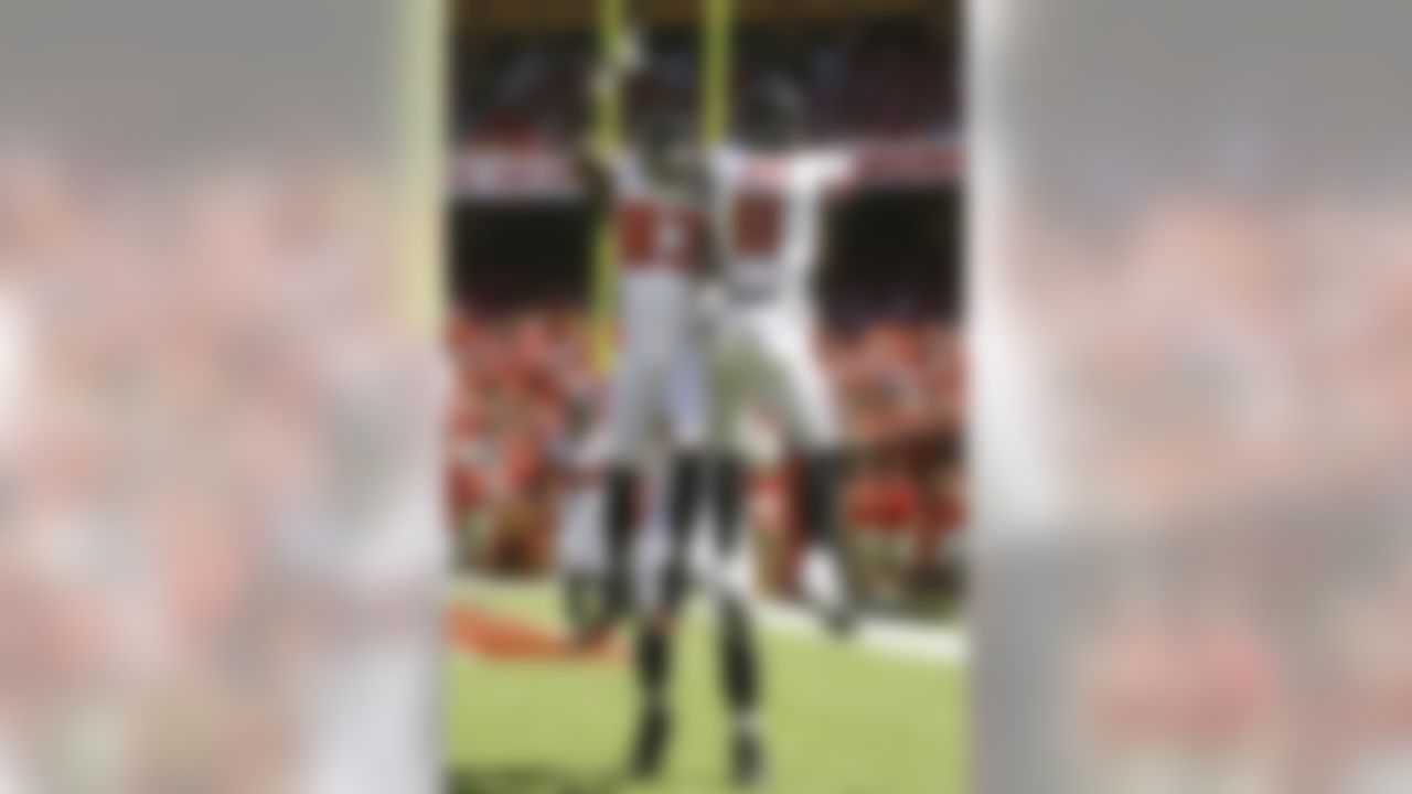 Atlanta Falcons wide receiver Julio Jones (11) celebrates his touchdown with teammate Harry Douglas (83) during the first half of an NFL football game against the Atlanta Falcons at Arrowhead Stadium in Kansas City, Mo., Sunday, Sept. 9, 2012. (AP Photo/Ed Zurga)