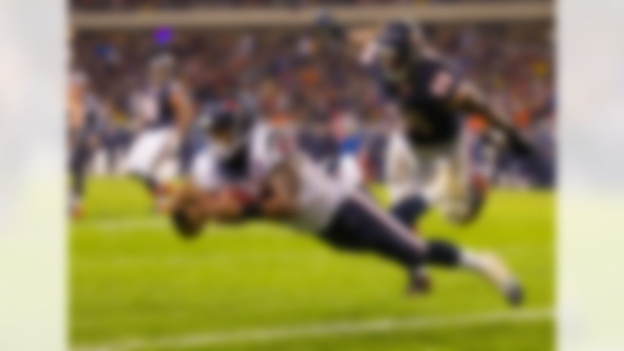 Running back Arian Foster #23 of the Houston Texans dives into the end zone for a touchdown during week ten action between the Houston Texans and Chicago Bears at Soldier Field in Chicago, IL on Nov. 11, 2012 (Todd Rosenberg/NFL)