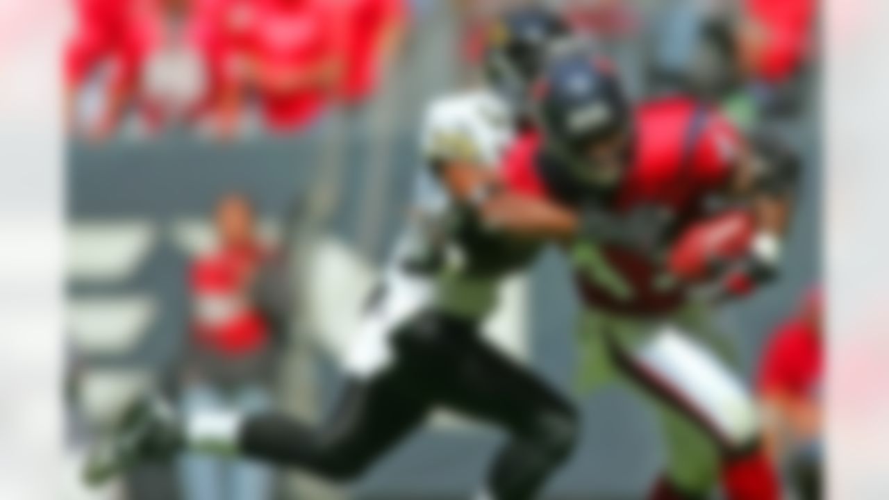 HOUSTON - OCTOBER 22:  Fullback Jameel Cook #43 of the Houston Texans makes a pass reception against Deon Grant #37 of the Jacksonville Jaguars at Reliant Stadium on October 22, 2006 in Houston, Texas. Photo by Getty Images.