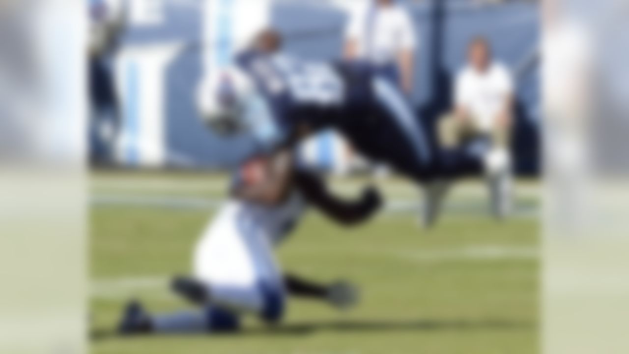 Tennessee Titans tight end Delanie Walker (82) is stopped by Indianapolis Colts cornerback Vontae Davis in the first half of an NFL football game Sunday, Oct. 23, 2016, in Nashville, Tenn. (AP Photo/Mark Zaleski)