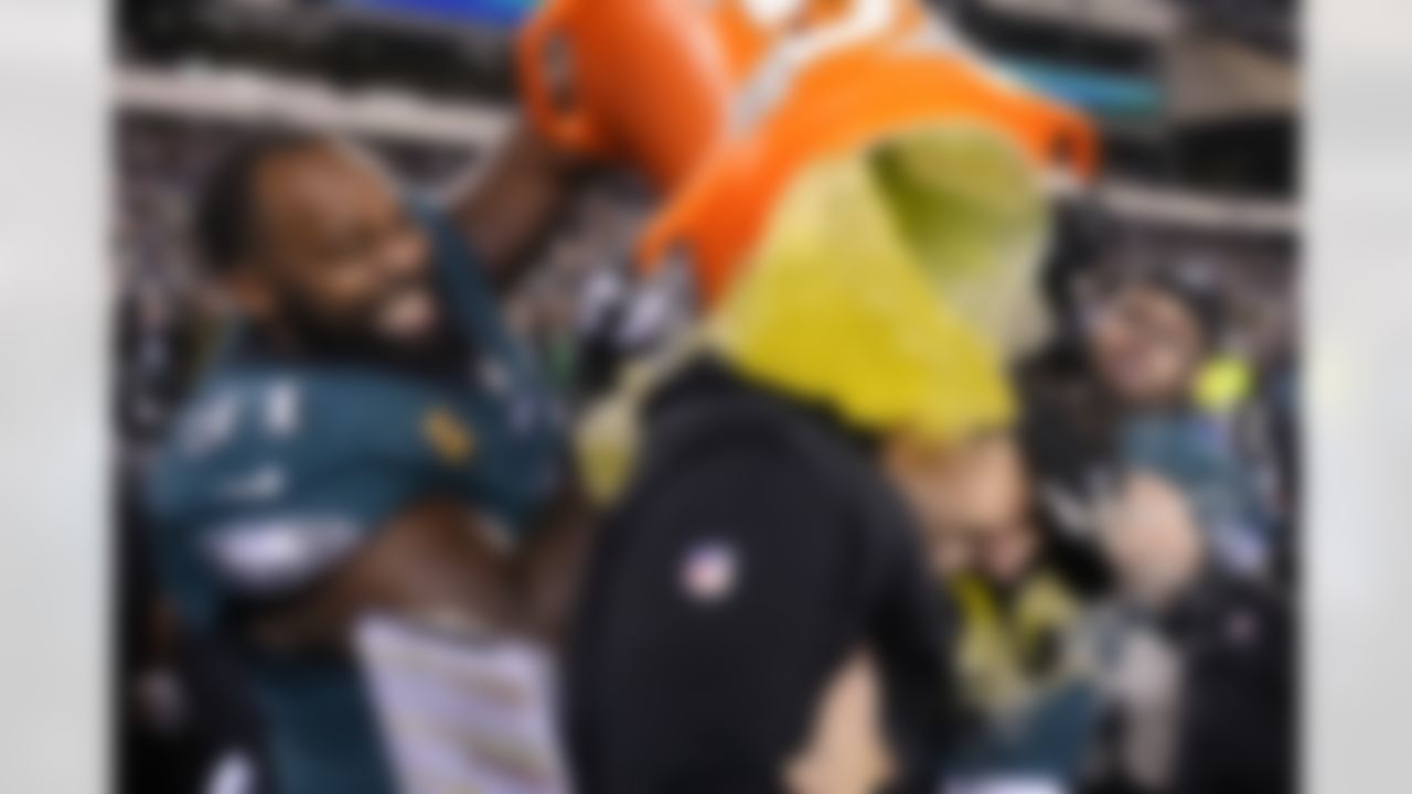 Philadelphia Eagles head coach Nick Sirianni, center, is doused by defensive tackle Fletcher Cox (91) and teammates during the second half of the NFC Championship NFL football game between the Philadelphia Eagles and the San Francisco 49ers on Sunday, Jan. 29, 2023, in Philadelphia.