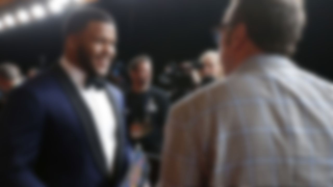 St. Louis Rams defensive tackle Aaron Donald talks with comedian Tom Arnold on the red carpet ofthe 4th Annual NFL Honors awards show at the Phoenix Symphony Hall on Saturday, January 31, 2015 in Phoenix.