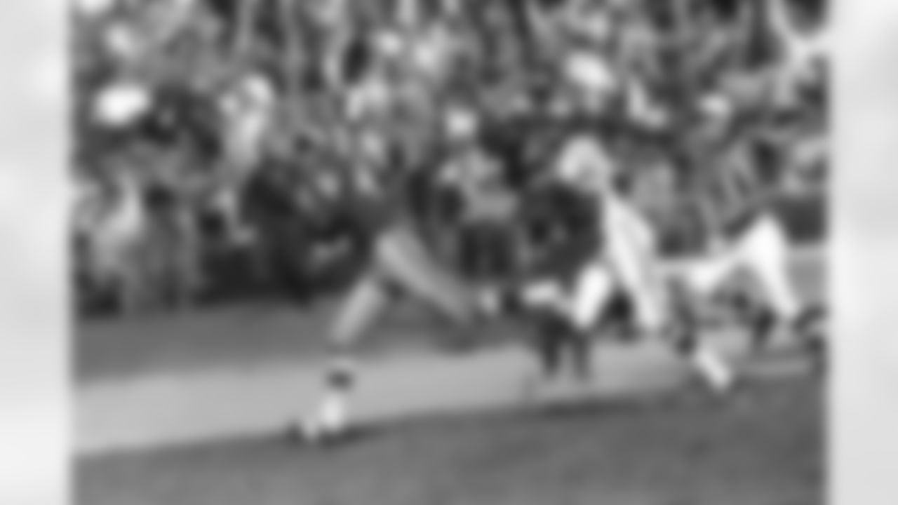 Charley Taylor (42) of the Washington Redskins juggles a 34-yard pass from Quarterback Sonny Jurgensen as he crosses the goal line with a third-quarter touchdown on Oct. 7, 1968 in Washington�s D.C. Stadium. In pursuit is Al Nelson (26) of the Philadelphia eagles. The Redskins defeated the Eagles, 17-14. (Associated Press)