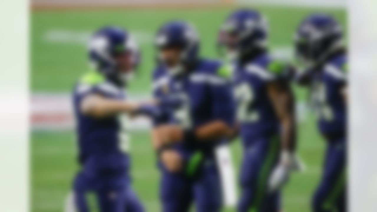 Seattle Seahawks quarterback Russell Wilson (3) celebrates with teammates during an NFL football game against the San Francisco 49ers on Sunday, January 3, 2021 in Glendale, Arizona.