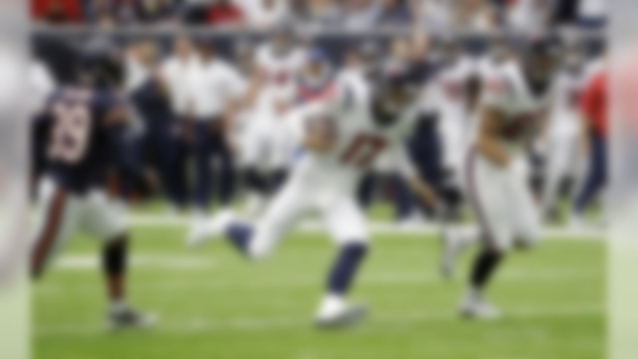 Houston Texans quarterback Brock Osweiler (17) scrambles during the first half of an NFL football game against the Chicago Bears, Sunday, Sept. 11, 2016, in Houston. (AP Photo/David J. Phillip)