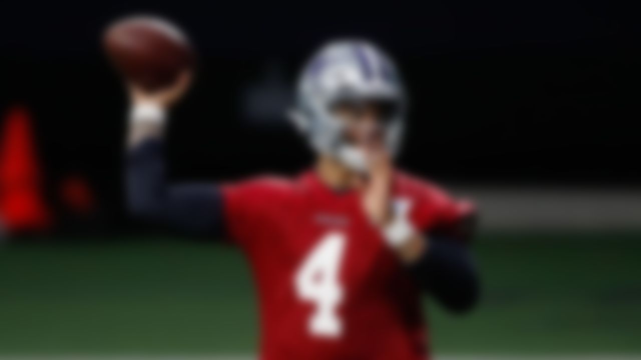 Dallas Cowboys quarterback Dak Prescott (4) throws during organized team activities Monday, May 24, 2021 in Frisco, Texas.