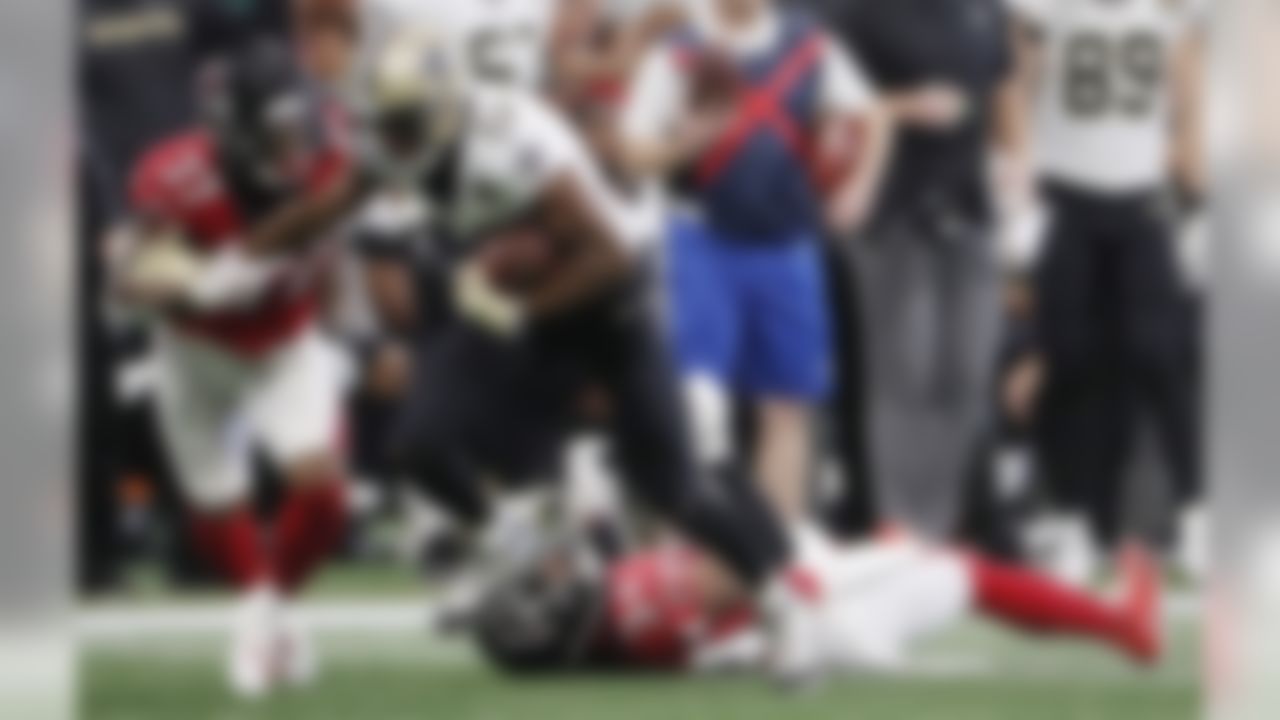 New Orleans Saints wide receiver Michael Thomas (13) runs past Atlanta Falcons cornerback Brian Poole (34) and Atlanta Falcons cornerback Ricardo Allen (37) during the first half of an NFL football game, Sunday, Sept. 23, 2018, in Atlanta. (AP Photo/David Goldman)