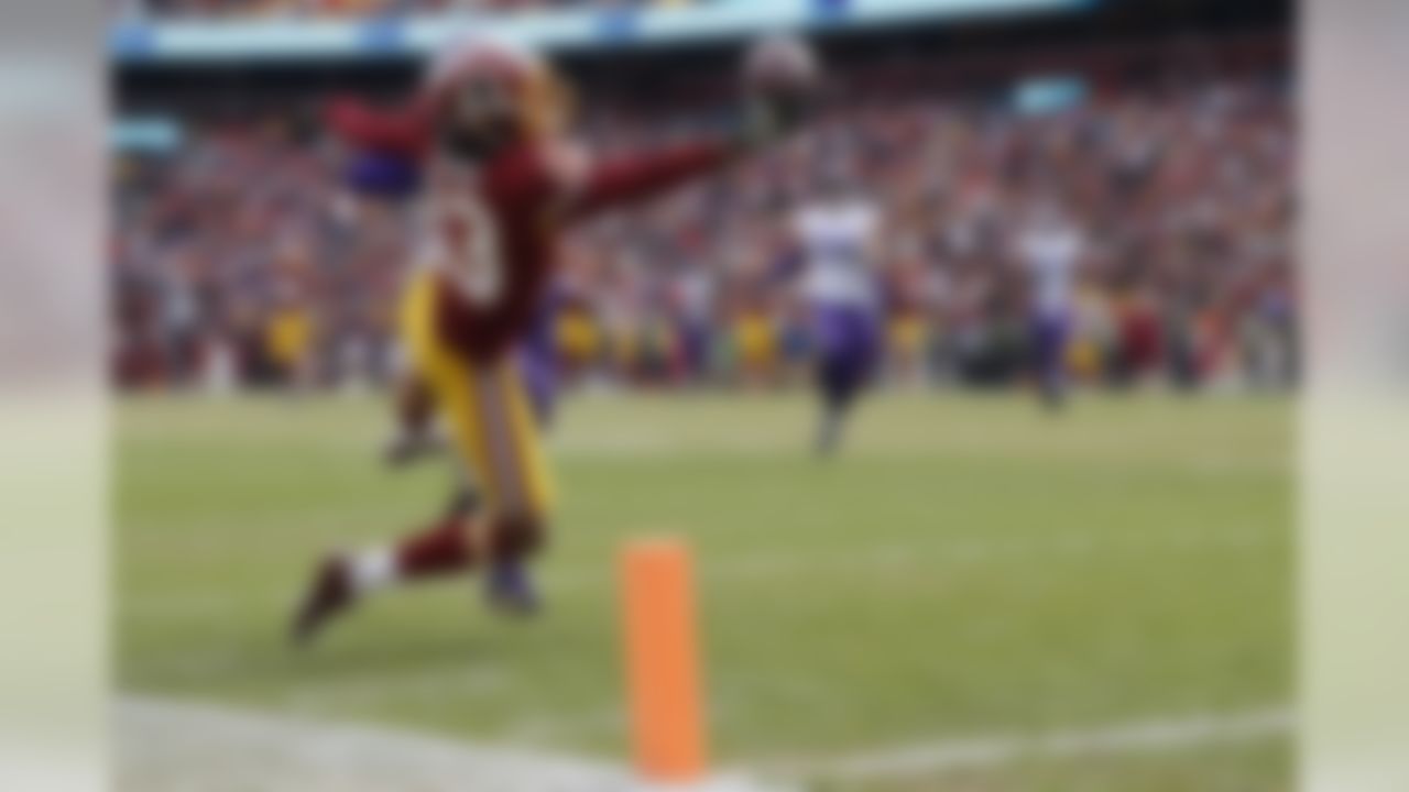 Washington Redskins wide receiver Maurice Harris (13) pulls in a touchdown pass during the first half of an NFL football game against the Minnesota Vikings in Landover, Md., Sunday, Nov. 12, 2017. (AP Photo/Alex Brandon)