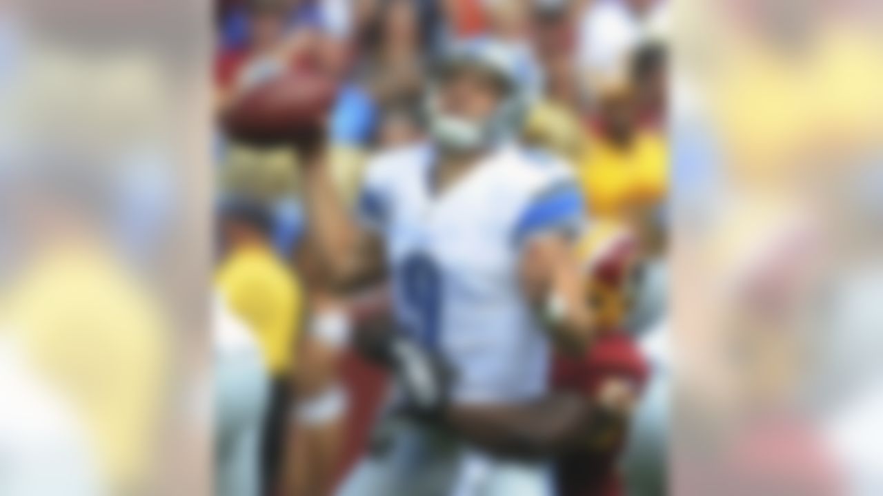 Detroit Lions quarterback Matthew Stafford is sacked by Washington Redskins inside linebacker London Fletcher during the first half of a NFL football game in Landover, Md., Sunday, Sept. 22, 2013. (AP Photo/Richard Lipski)
