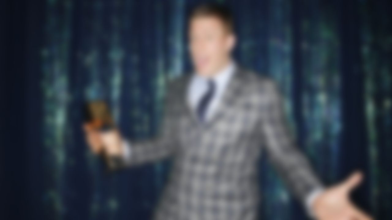 Houston Texans defensive end J.J. Watt poses for the photograph with AP Defensive Player of the Year award behind stage during the 4th Annual NFL Honors awards show at the Phoenix Symphony Hall on Saturday, January 31, 2015 in Phoenix, AZ.