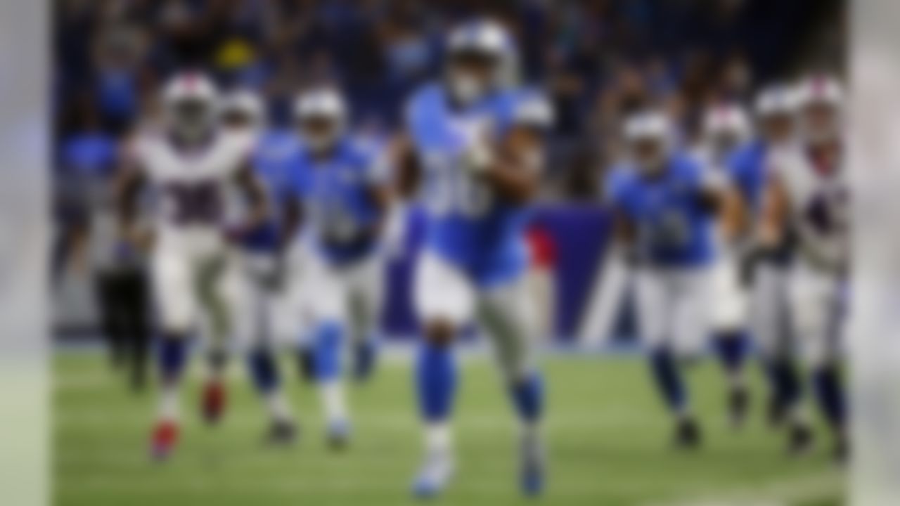 Detroit Lions running back Dwayne Washington runs for a 58-yard touchdown during the first half of NFL preseason football game against the Buffalo Bills, Thursday, Sept. 1, 2016, in Detroit. (AP Photo/Rick Osentoski)