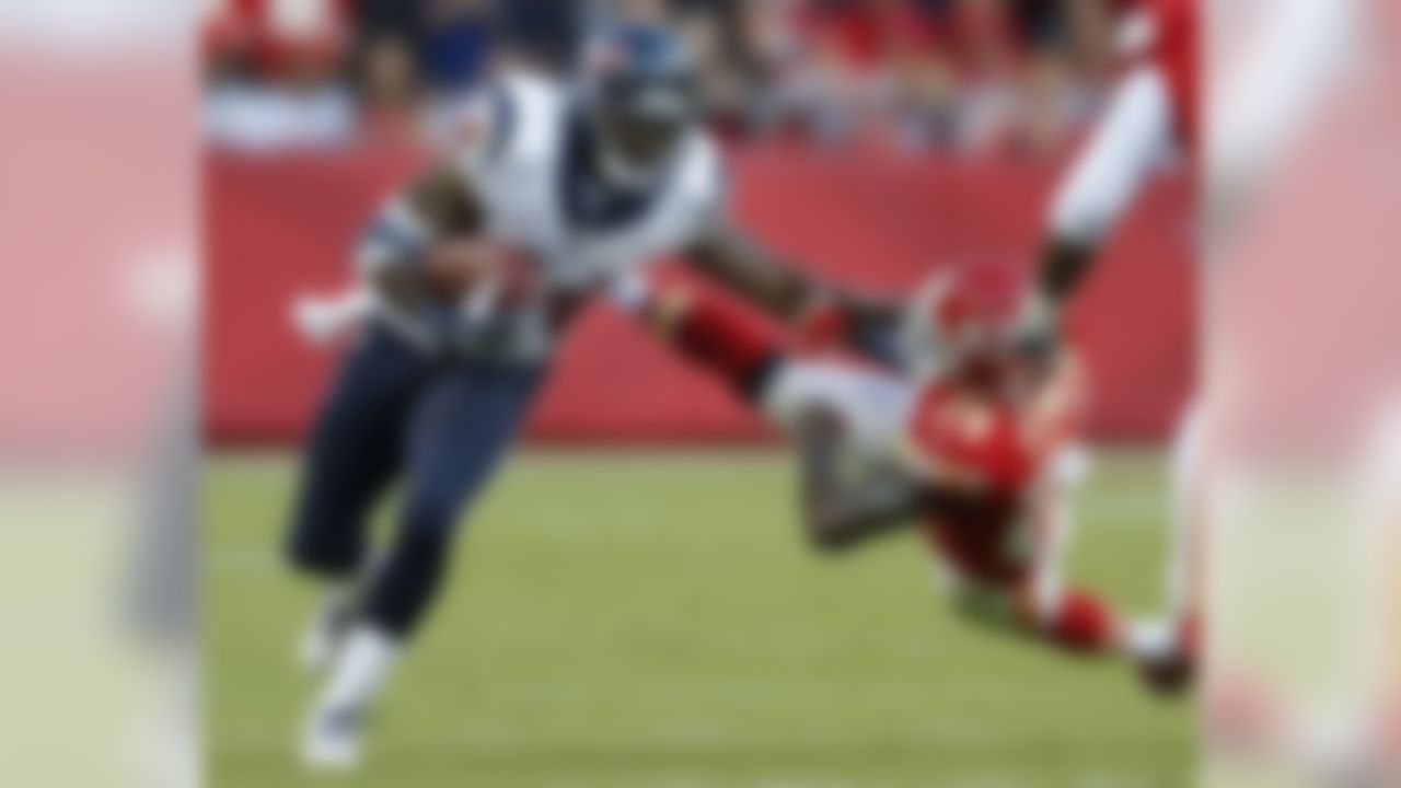 Houston Texans defensive back Elbert Mack (44) is forced out of bounds by Kansas City Chiefs cornerback Brandon Flowers (24) during the second half of an NFL football game at Arrowhead Stadium in Kansas City, Mo., Sunday, Oct. 20, 2013. (AP Photo/Ed Zurga)