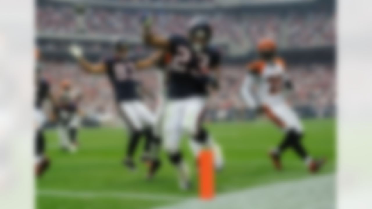 Houston Texans running back Arian Foster #23 running with the football 42 yards for a touchdown in the fourth quarter during the NFL game, Cincinnati Bengals against the Houston Texans, NFL divisional playoff football, on Saturday, January 7, 2012 at Reliant Stadium in Houston, Texas. The Texans beat the Bengals 31-10.  (AP Photo/David Drapkin)