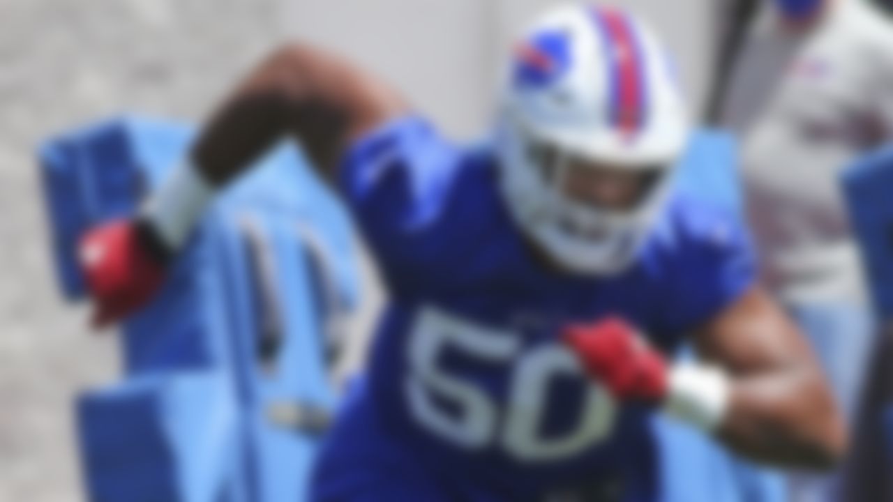 Buffalo Bills defensive end Greg Rousseau (50) runs a drill during an NFL football rookie minicamp in Orchard Park, N.Y., Friday, May 14, 2021.