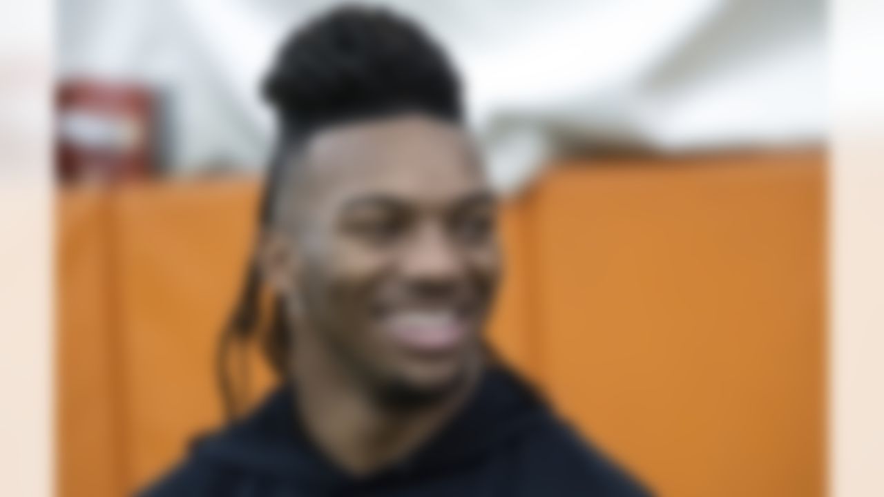 Texas running back Bijan Robinson looks on from the sidelines as he watches other players work out for NFL scouts during Texas' pro day on Thursday, March 9, 2023, in Austin, Texas.