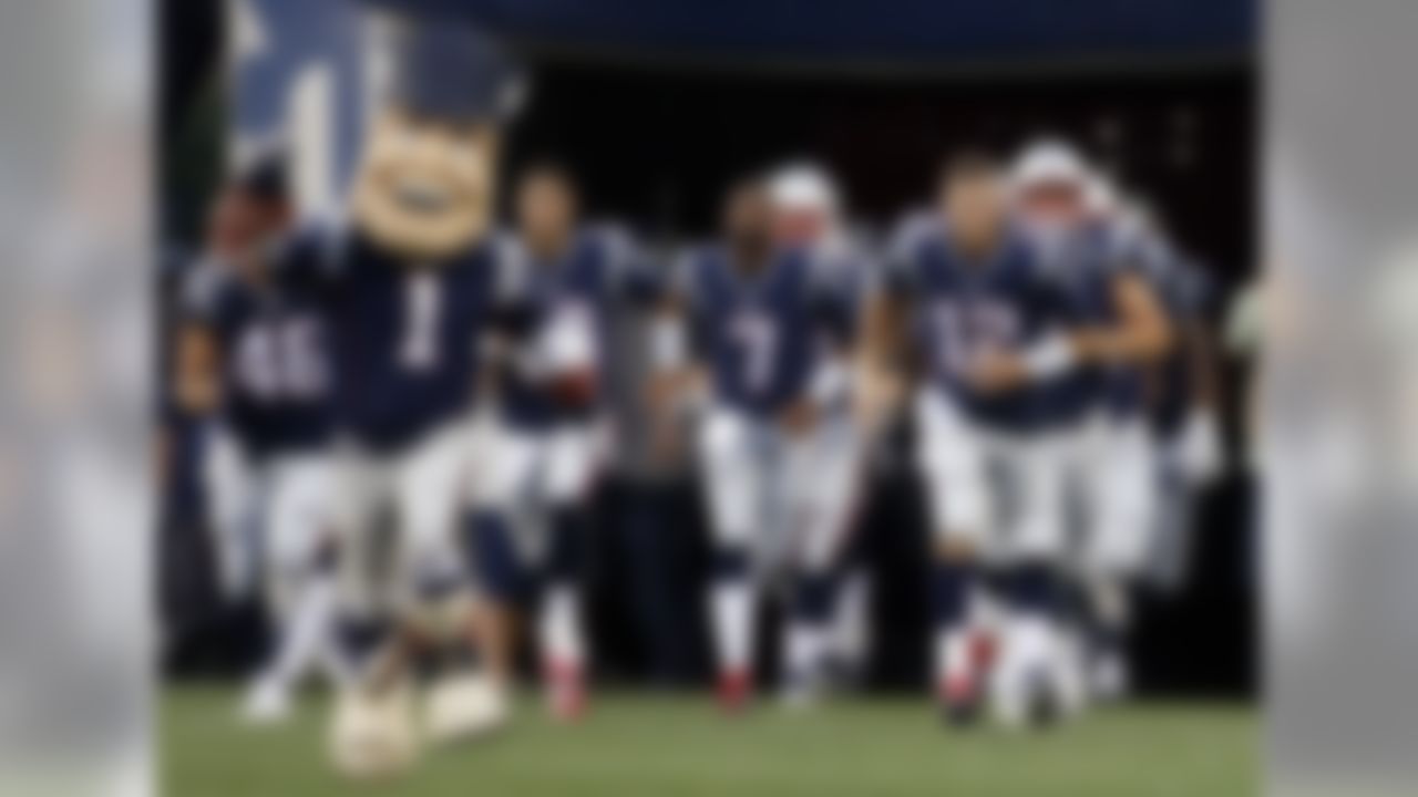 New England Patriots quarterback Tom Brady (12) leads his team onto the field for an NFL preseason football game against the Jacksonville Jaguars, Thursday, Aug. 10, 2017, in Foxborough, Mass. (AP Photo/Mary Schwalm)