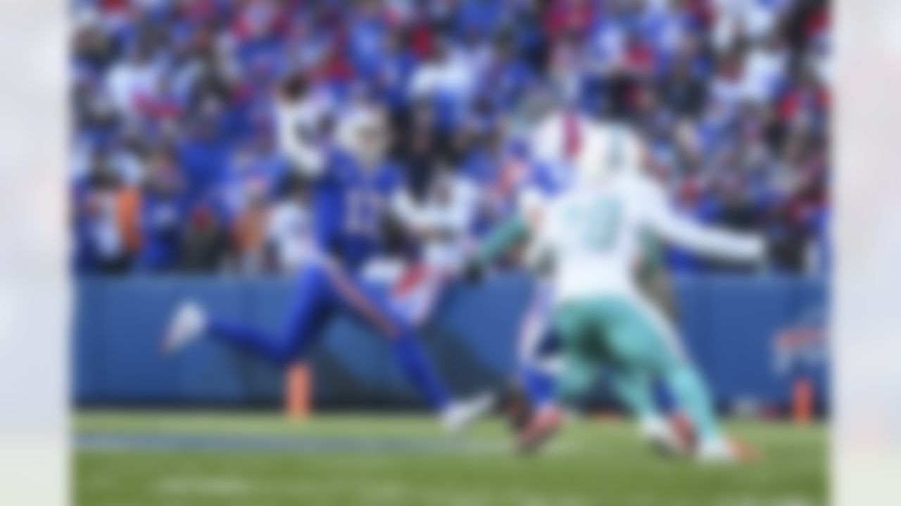 Buffalo Bills quarterback Josh Allen (17) runs the ball during an NFL Super Wild Card Weekend playoff game against the Miami Dolphins on Sunday, January 15, 2023 in Orchard Park, New York.