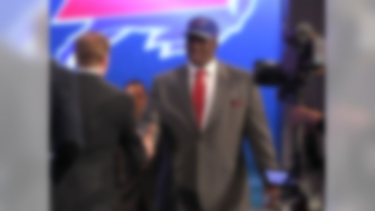 Cyrus Kouandijo greets NFL Commissioner Roger Goodell after being selected by the Buffalo Bills during the 2014 NFL Draft at Radio City Music Hall on May 9, 2014 in New York, NY. (Perry Knotts/NFL)