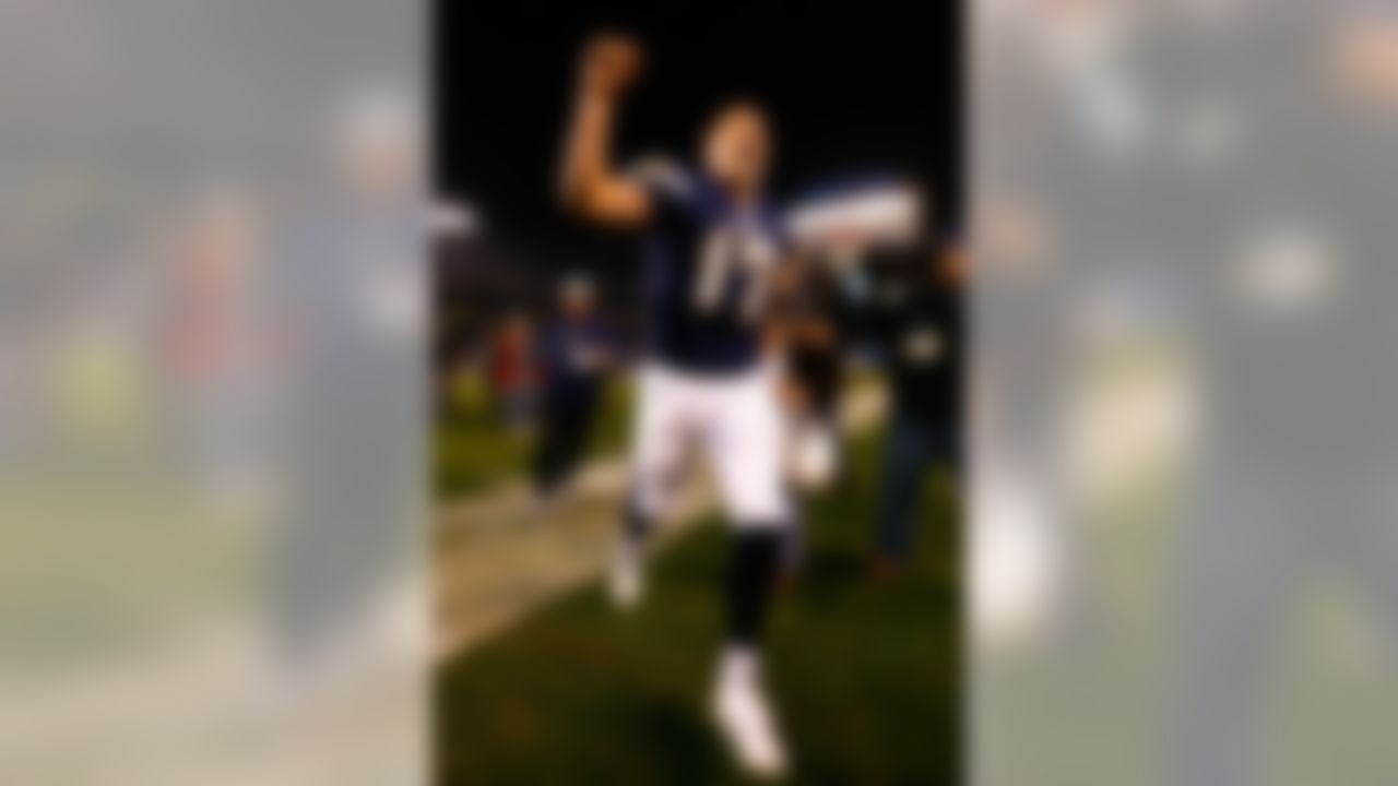 SAN DIEGO - DECEMBER 28:  Quarterback Philip Rivers #17 of the San Diego Chargers celebrates after defeating the Denver Broncos in the NFL game at Qualcomm Stadium on December 28, 2008 in San Diego, California. The Chargers defeated the Broncos 52--21. (Photo by Jeff Gross/Getty Images)