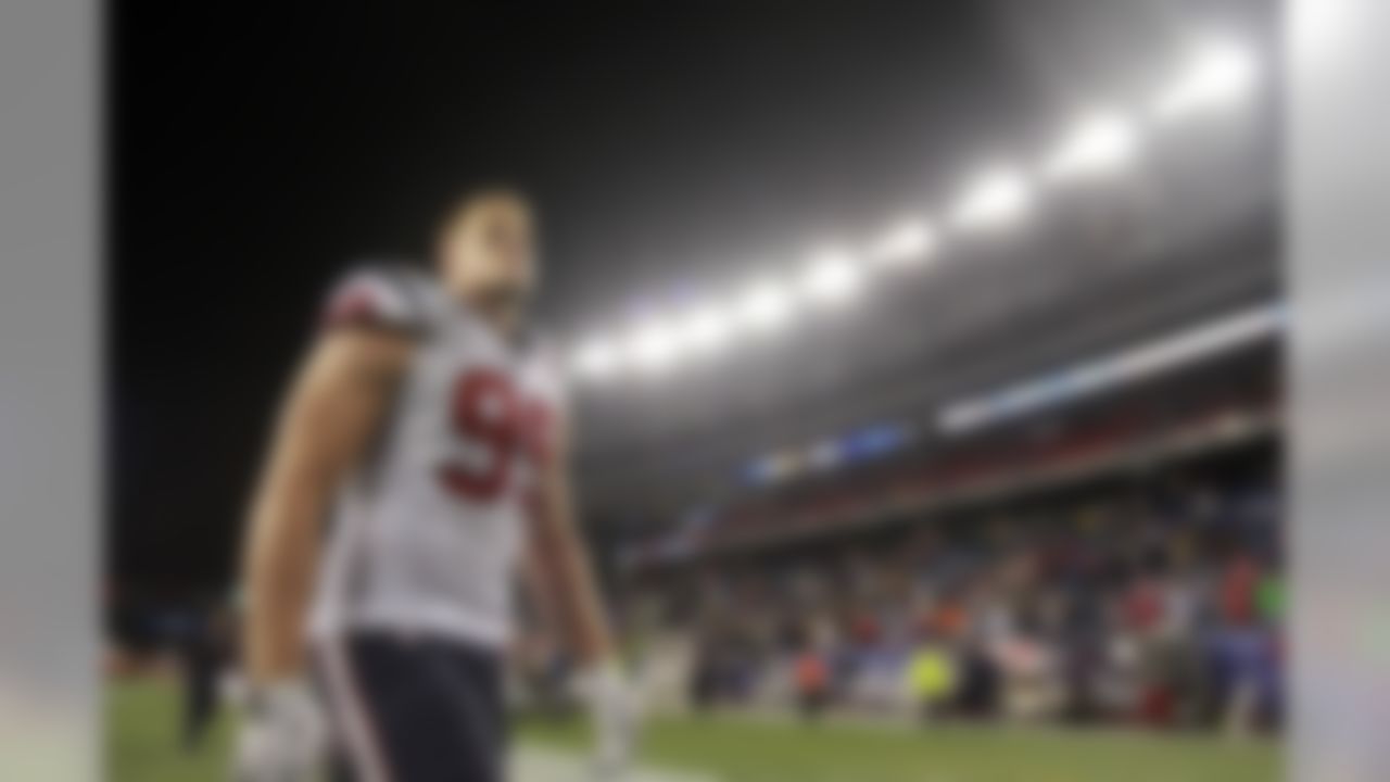 Houston Texans defensive end J.J. Watt (99) reacts as he walks off the field following an NFL football game against the New England Patriots in Foxborough, Mass., Monday, Dec. 10, 2012. The Patriots won 42-14. (AP Photo/Steven Senne)