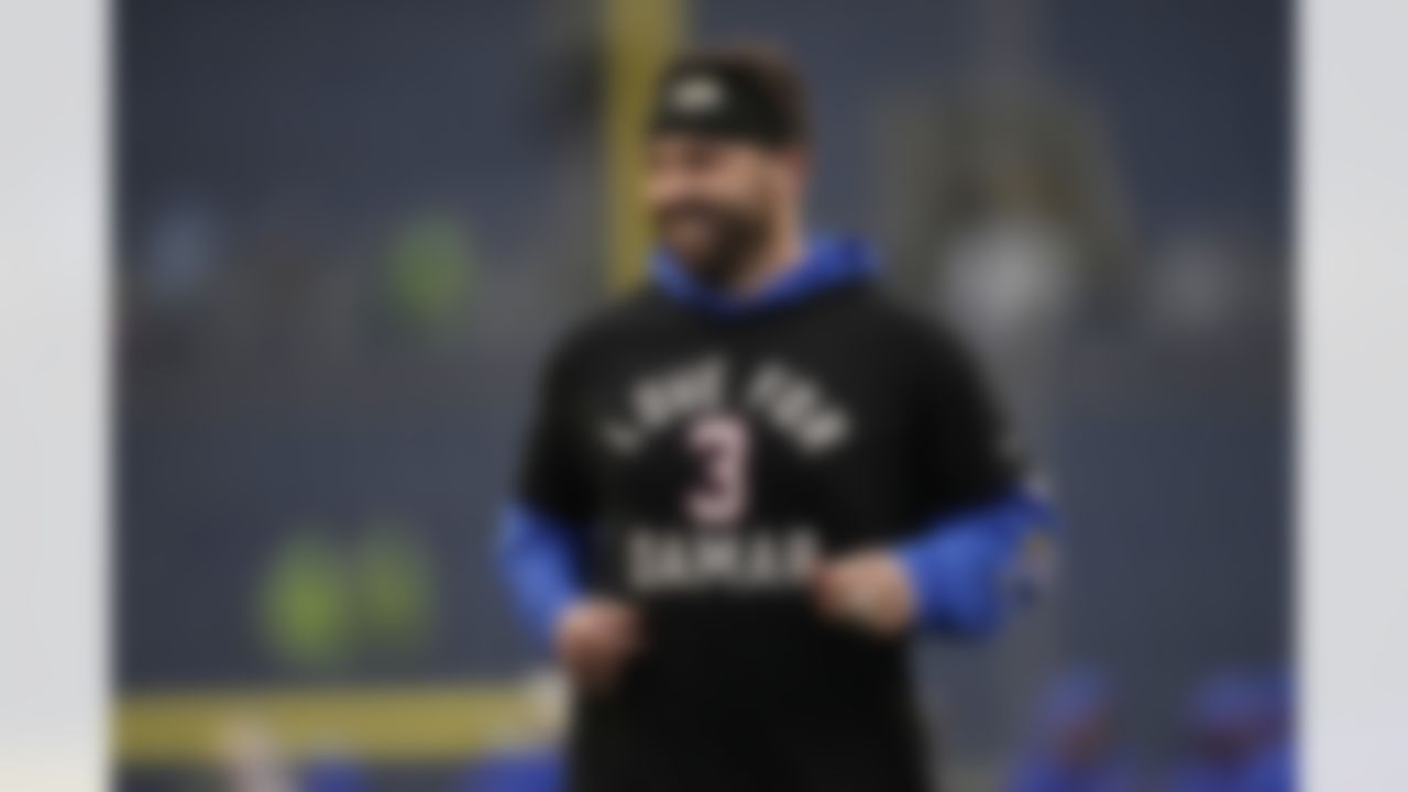 Los Angeles Rams quarterback Baker Mayfield warms up wearing a t-shirt with a message for Buffalo Bills safety Damar Hamlin before an NFL football game against the Seattle Seahawks Sunday, Jan. 8, 2023, in Seattle.