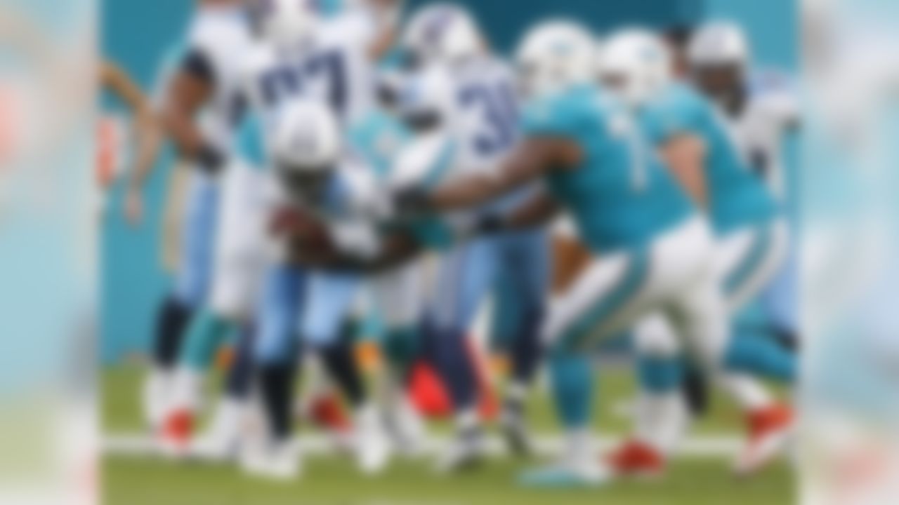 Tennessee Titans safety Rashad Johnson recovers a fumble during the first half of an NFL preseason football game against the Miami Dolphins, Thursday, Sept. 1, 2016 in Miami Gardens, Fla. Johnson is tackled by Miami Dolphins wide receiver Leonte Carroo (88). (AP Photo/Wilfredo Lee)