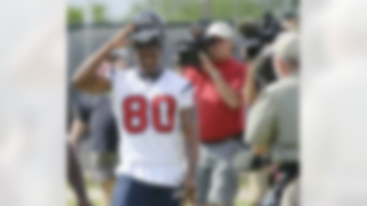 Houston Texans receiver Andre Johnson arrives at an NFL football mini camp, Thursday, May 20, 2010, in Houston. Johnson is in a contract dispute with the Texans and missed the opening three voluntary practices. (AP Photo/Dave Einsel)