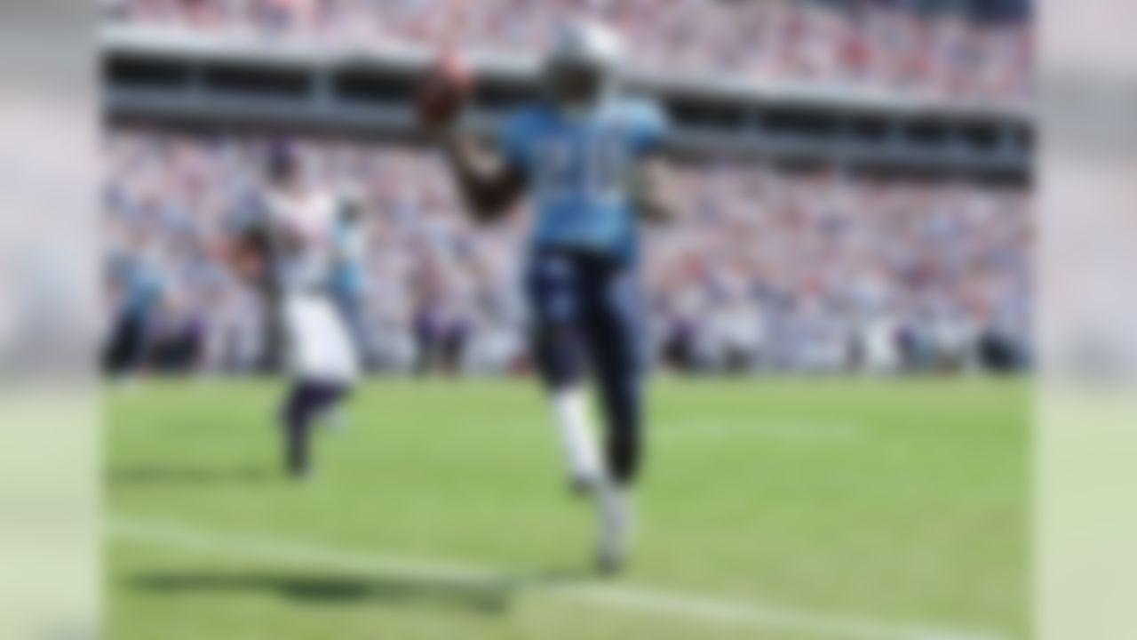 NASHVILLE, TN - SEPTEMBER 28:  Running back Chris Johnson #28 of the Tennessee Titans celebrates as he scores a touchdown against the Minnesota Vikings at LP Field on September 28, 2008 in Nashville, Tennessee.  (Photo by Doug Benc/Getty Images)