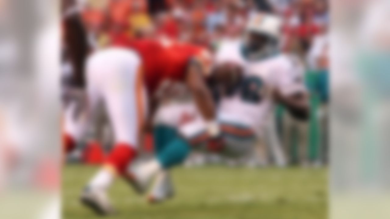 KANSAS CITY, MO - AUGUST 16:  Jesse Chatman #28 of the Miami Dolphins is stopped short of the endzone by Derrick Johnson #56 of the Kansas City Chiefs during the 1st quarter of the preseason game on August 16, 2007 at Arrowhead Stadium in Kansas City, Missouri.  (Photo by Jamie Squire/Getty Images)