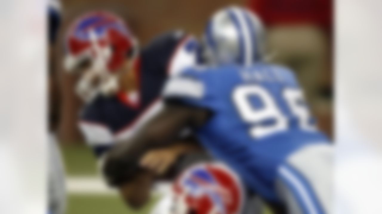 DETROIT - OCTOBER 15: J.P. Losman #7 of the Buffalo Bills is sacked by James Hall #96 of the Detroit Lions on October 15, 2006 at Ford Field in Detroit, Michigan. Detroit defeated Buffalo with a score of 20 to 17. Photo by Getty Images.