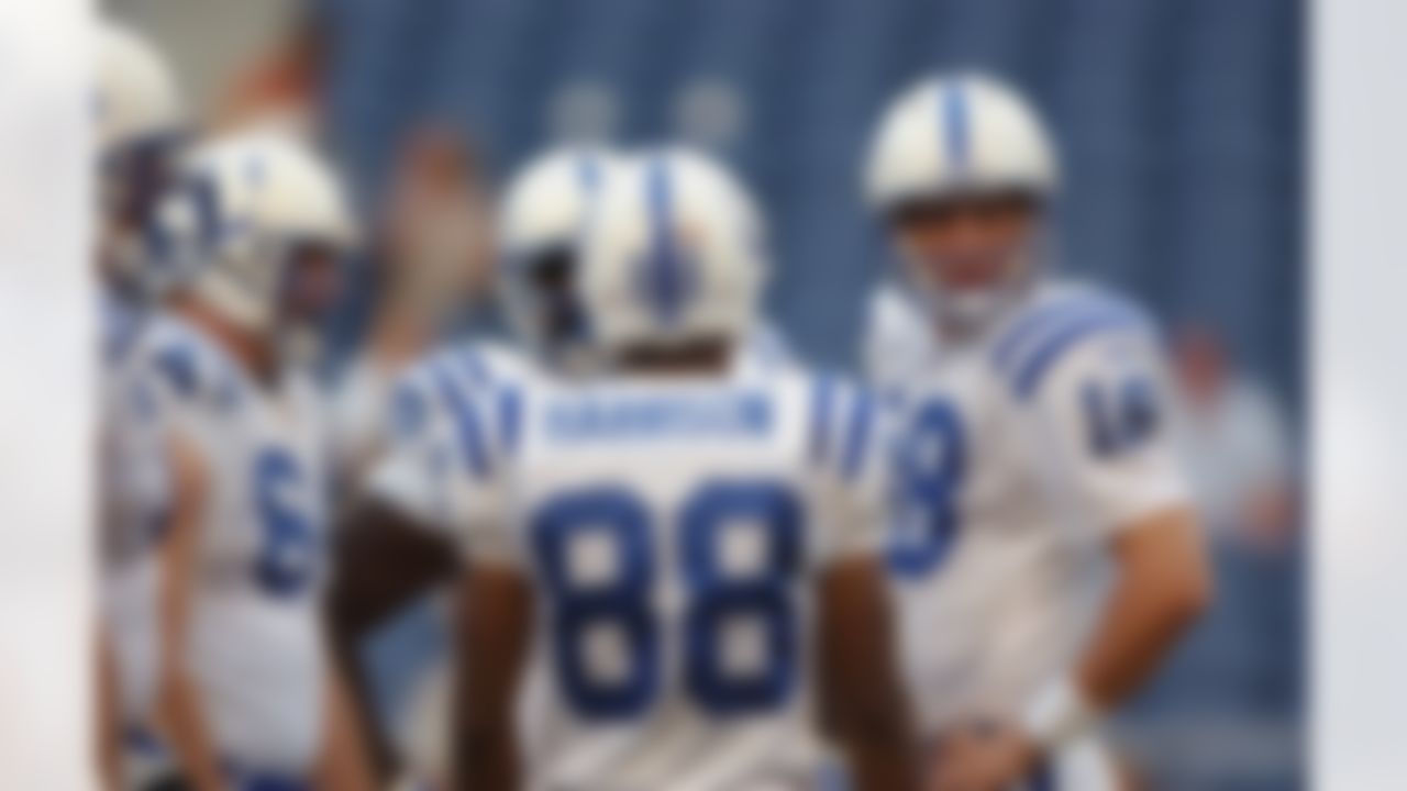 SEATTLE - AUGUST 10: Quarterback Peyton Manning #18 of the Indianapolis Colts stands in the huddle during the inaugural NFL preseason game at Seahawks Stadium against the Seattle Seahawks on August 10, 2002 in Seattle, Washington. The Colts won 28-10. (Photo by Otto Greule Jr/Getty Images)
