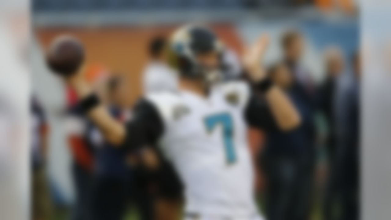 Jacksonville Jaguars quarterback Chad Henne (7) throws a pass during warmups before an NFL preseason football game against the Chicago Bears in Chicago, Thursday, Aug. 14, 2014. (AP Photo/Charles Rex Arbogast)