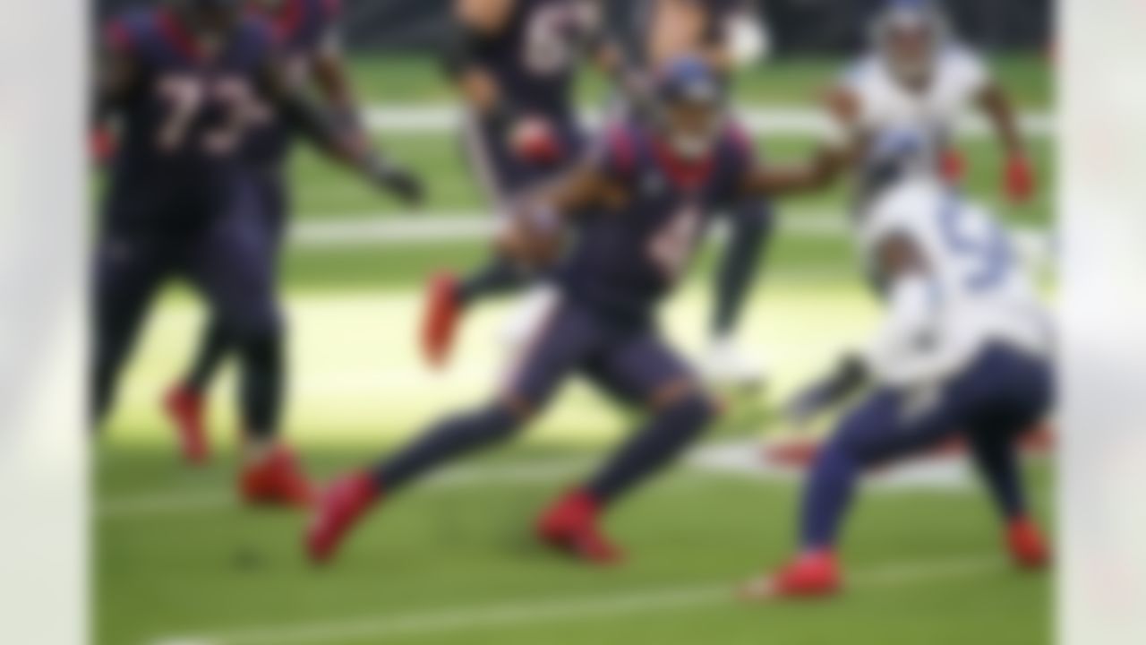 Houston Texans quarterback Deshaun Watson (4) runs the ball during an NFL football game against the Tennessee Titans on Sunday, January 3, 2021 in Houston, Texas.