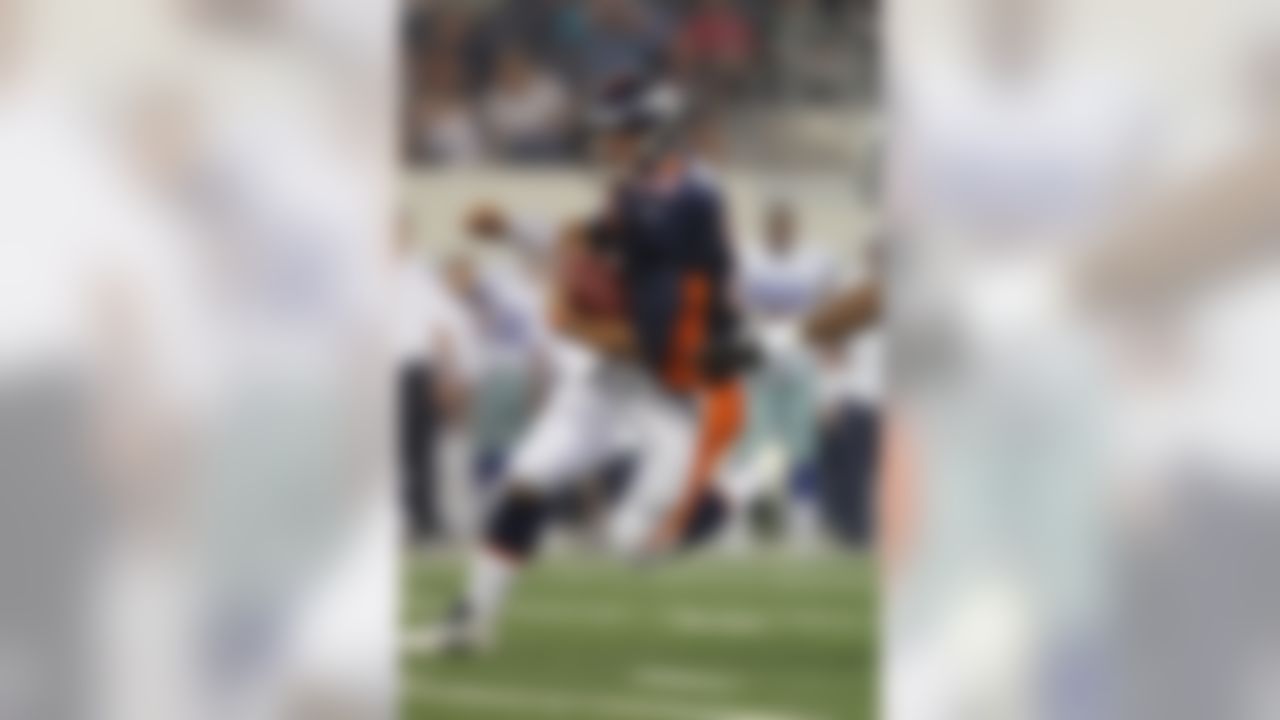 Aug11, 2011; Arlington, TX, USA; Denver Broncos quarterback Tim Tebow (15) scrambles in the second quarter against the Dallas Cowboys at Cowboys Stadium. Mandatory Credit: Matthew Emmons-US PRESSWIRE