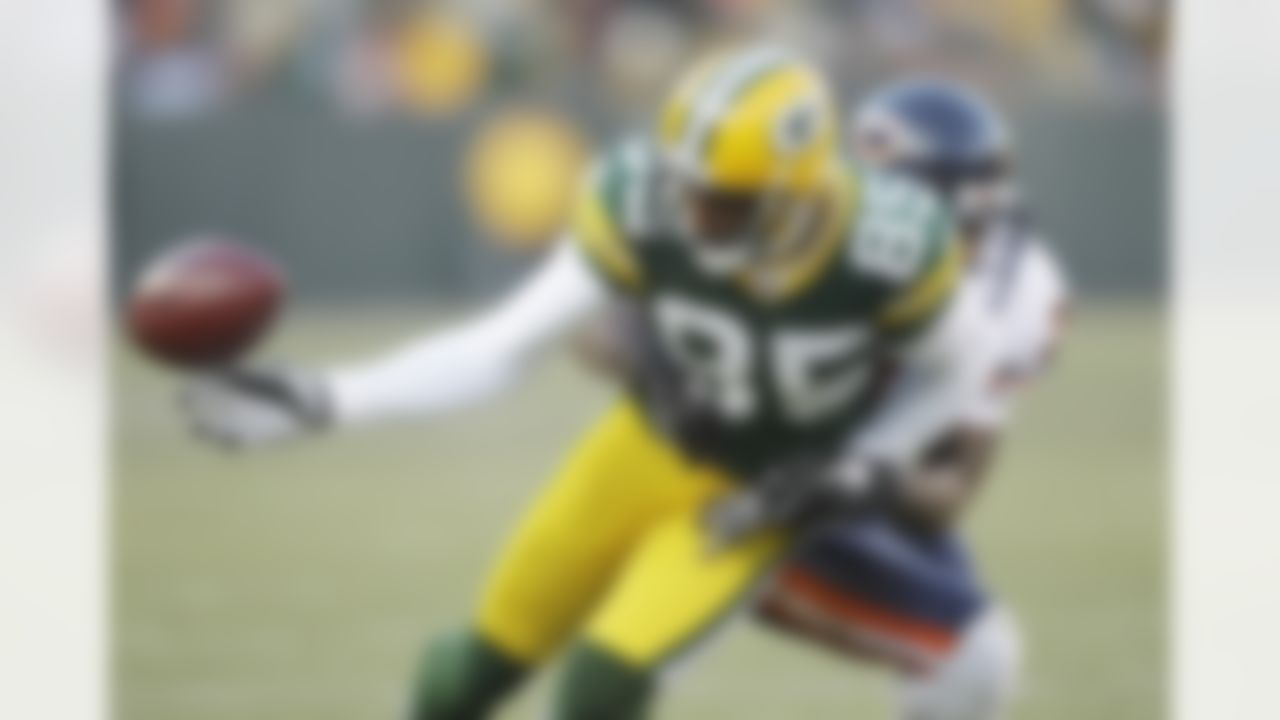 Chicago Bears' Tim Jennings breaks up a pass intended for Green Bay Packers' Greg Jennings (85) during the first half of an NFL football game Sunday, Jan. 2, 2011, in Green Bay, Wis. (AP Photo/Morry Gash)