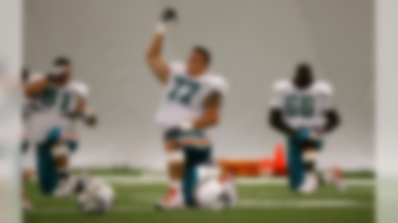 DAVIE, FL - JULY 29:  Tackle Jake Long #77 of the Miami Dolphins works out during training camp at Nova Southeastern University on July 29, 2008 in Davie, Florida.  (Photo by Doug Benc/Getty Images)